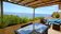 Die Terrasse der Minivilla T1 La Cote Bleue ist großzügig gestaltet und hat einen herrlichen Meerblick.